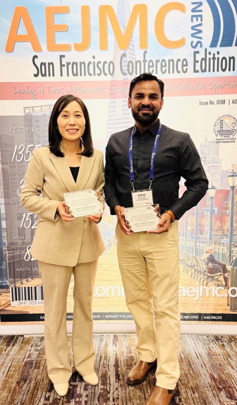 EmTech Research Group celebrating the Top Faculty Paper Award at AEJMC 2025